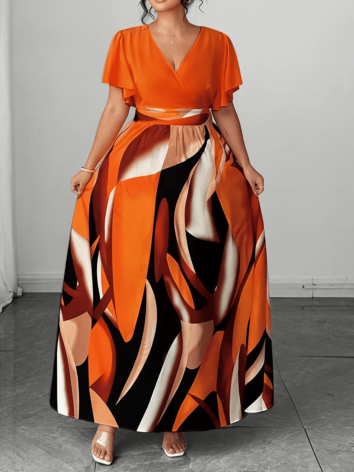 Elegant Orange Abstract Print Maxi Dress for Women with V Neck Flutter Sleeve Cutout Waist Flowing Style